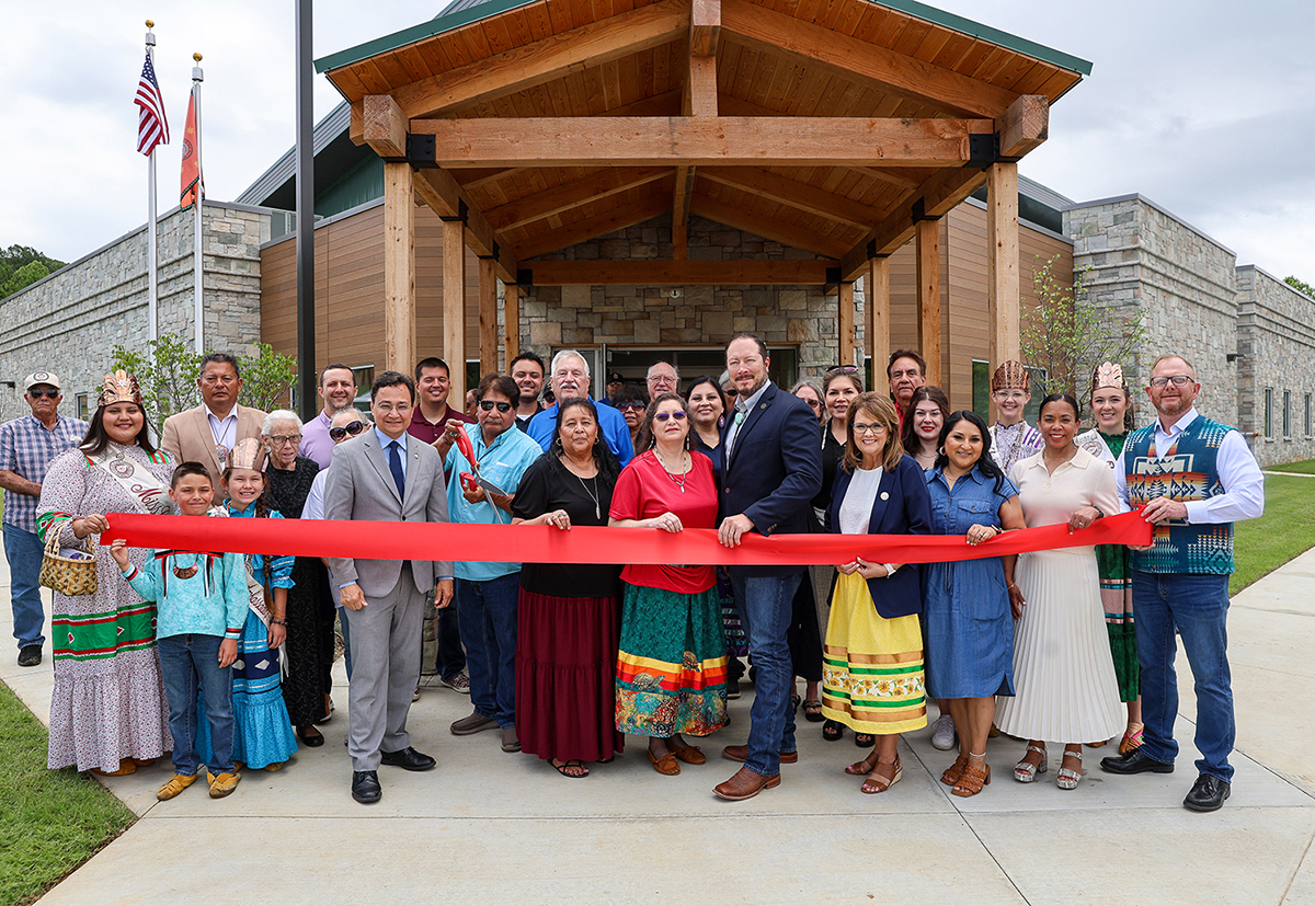 Cherokee Nation leaders and members of the community cut ribbon to celebrate the grand opening of the new Marble City Community Center